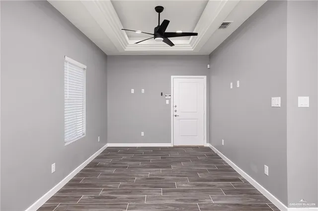 a view of an empty room and window