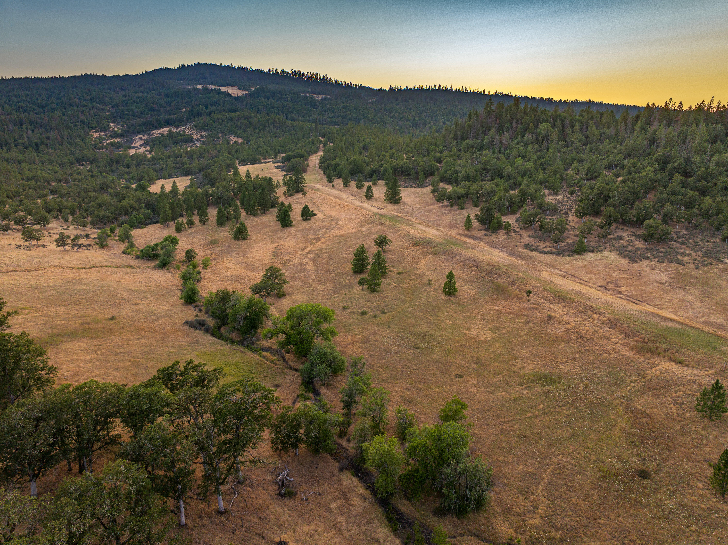 536 Ragsdale Road Trail, OR 97541 - Photo 7 of 67 a view of a mountain with a field