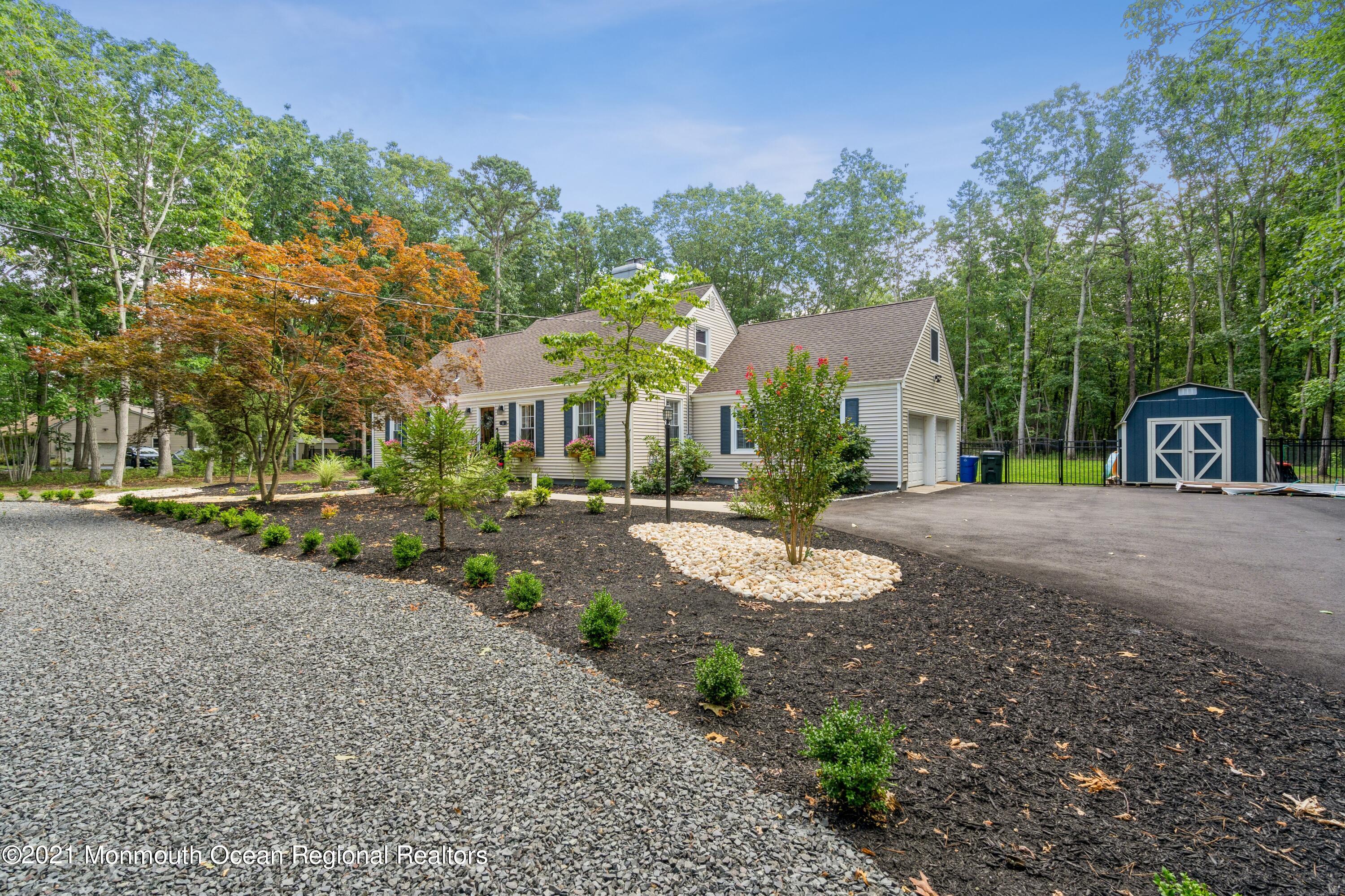 6 Brookside Road Millstone Township, NJ 08510 - Photo 2 of 27 a view of a house with a street