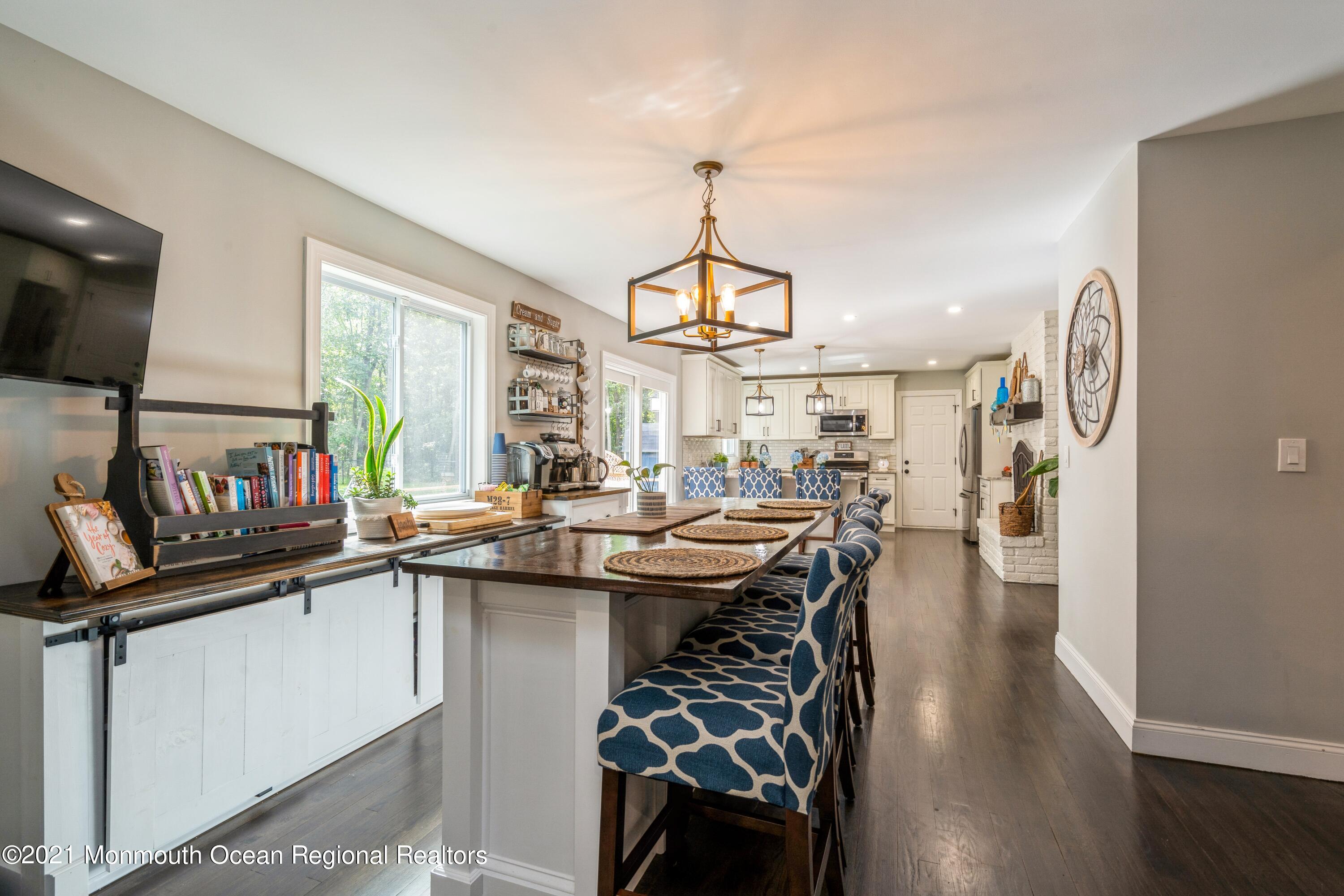 6 Brookside Road Millstone Township, NJ 08510 - Photo 11 of 27 a kitchen with lots of counter top space and wooden floor