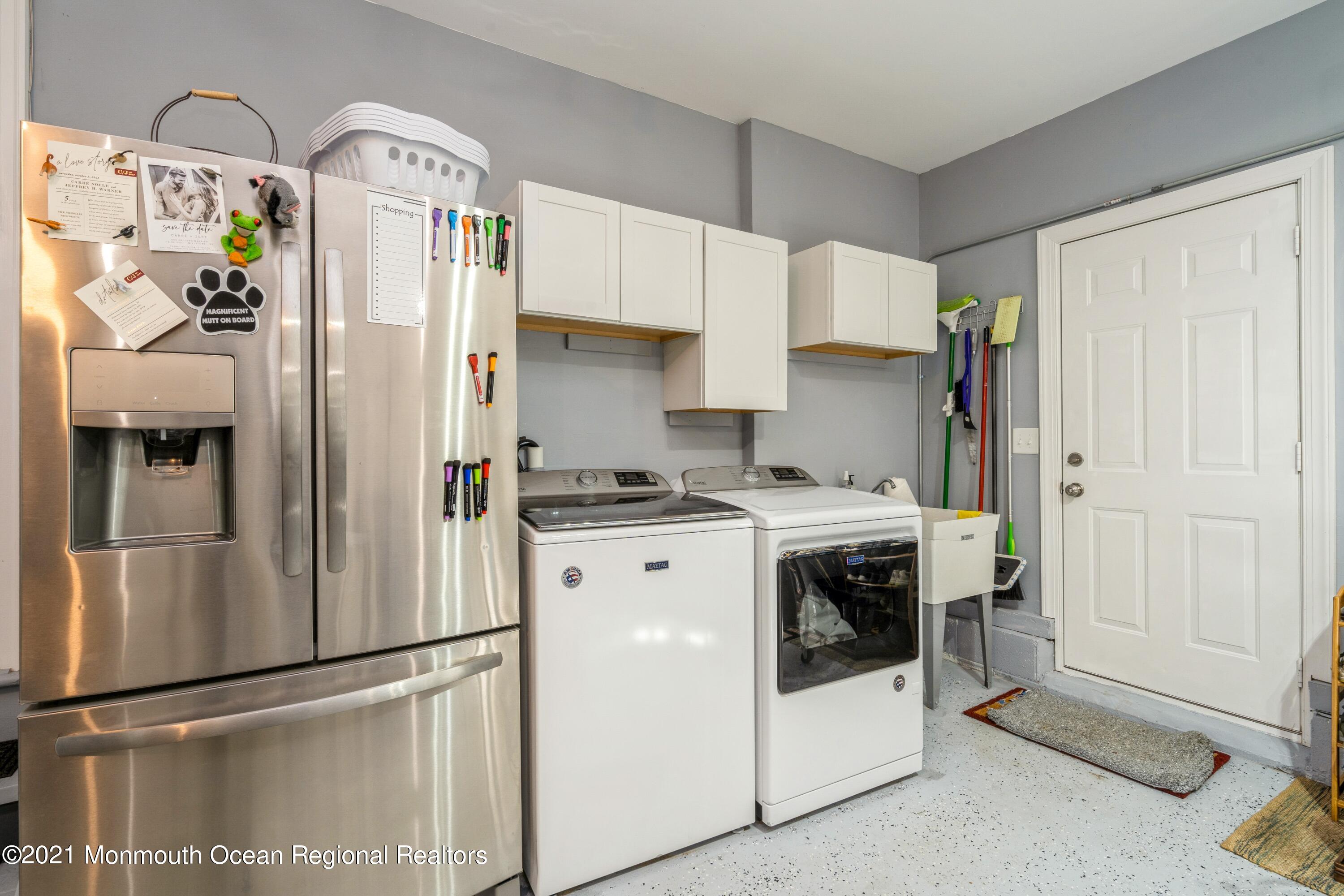 6 Brookside Road Millstone Township, NJ 08510 - Photo 15 of 27 a kitchen with a refrigerator a stove and cabinets