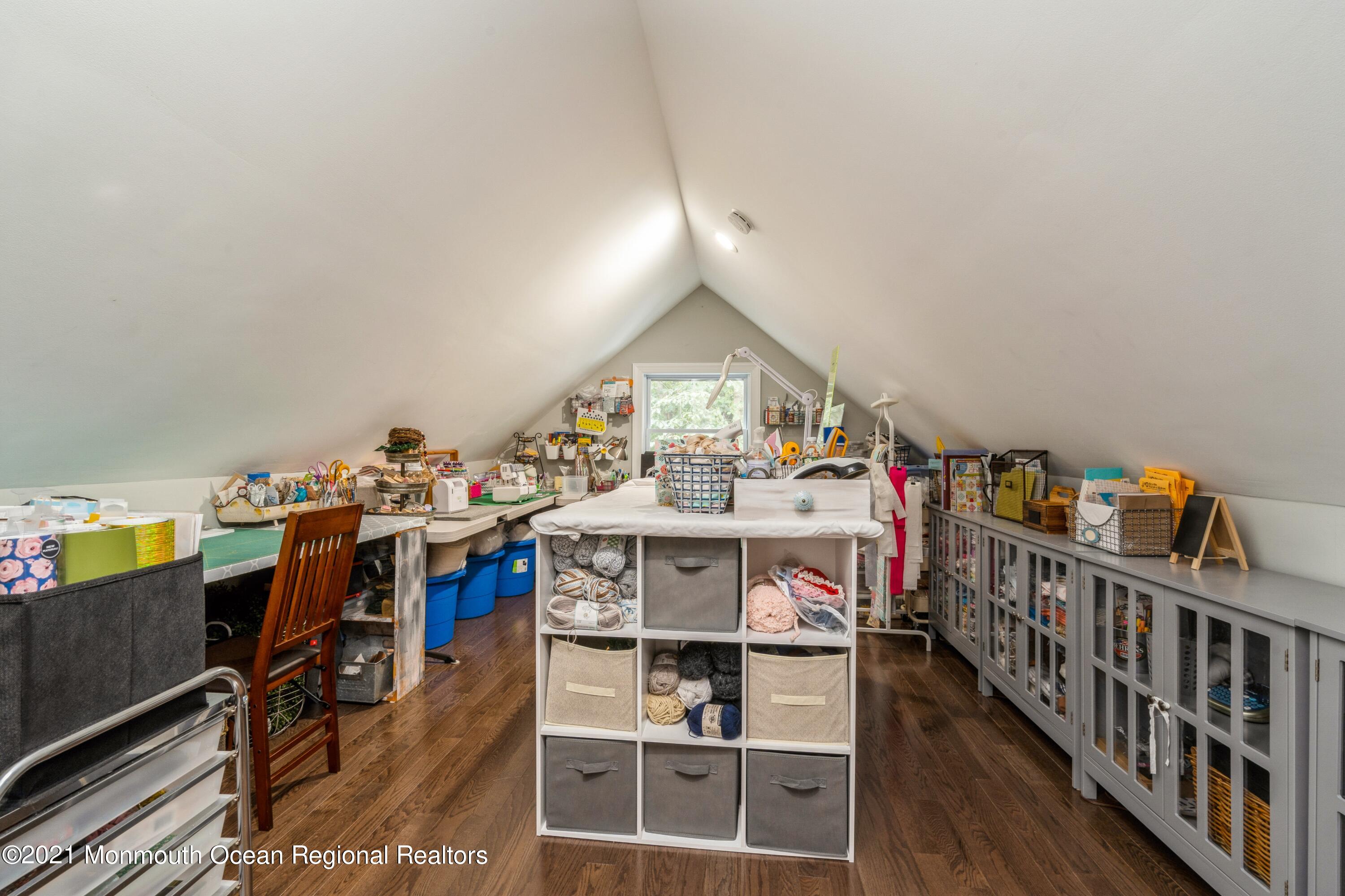 6 Brookside Road Millstone Township, NJ 08510 - Photo 25 of 27 a view of a room with racks on the wall