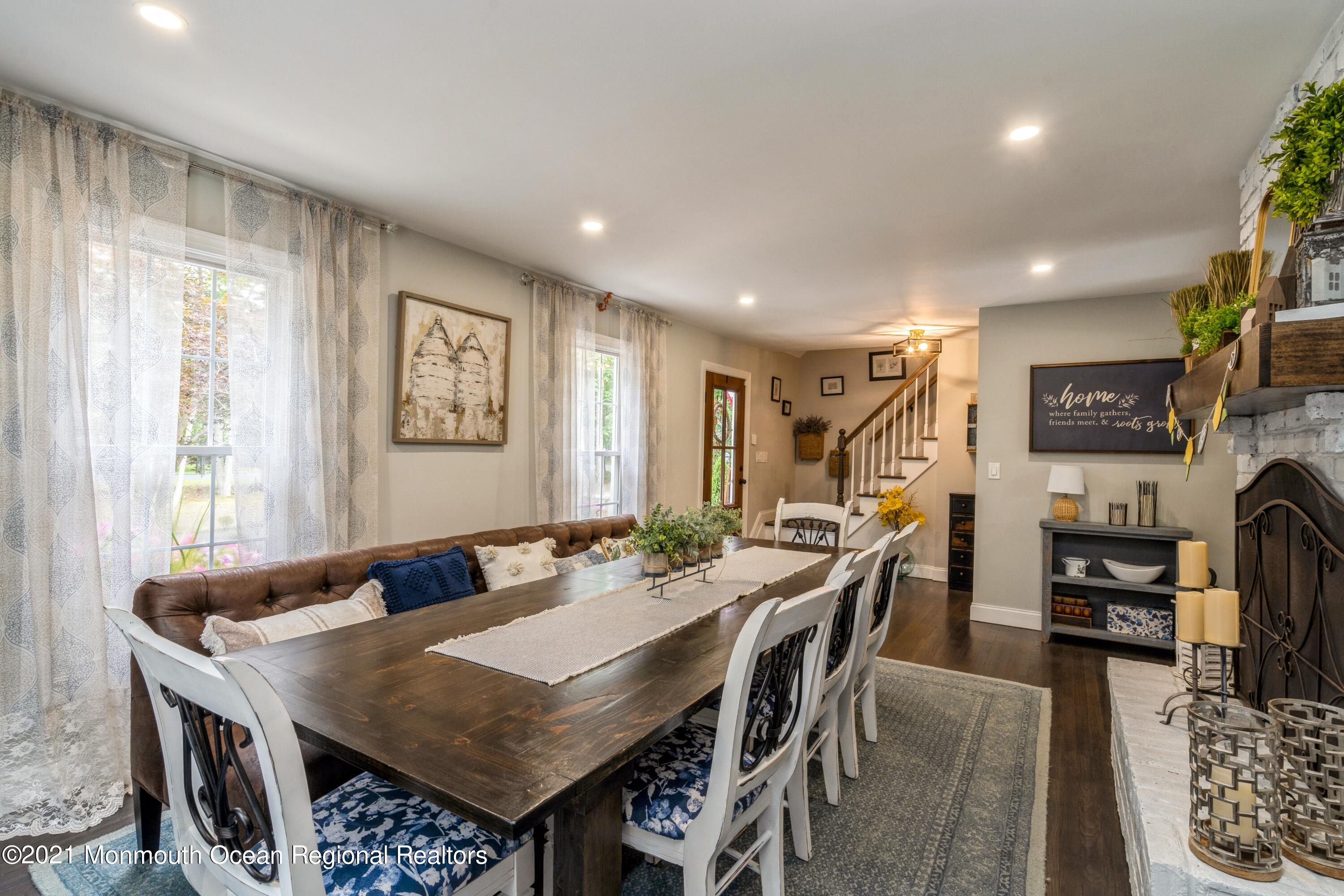 6 Brookside Road Millstone Township, NJ 08510 - Photo 5 of 27 a view of a dining room with furniture