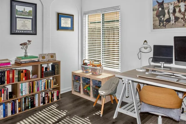 a bed room with a bed and a window