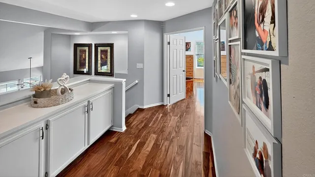a bathroom with a tub shower and sink