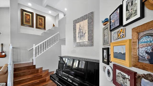 a kitchen with stainless steel appliances a refrigerator stove and microwave