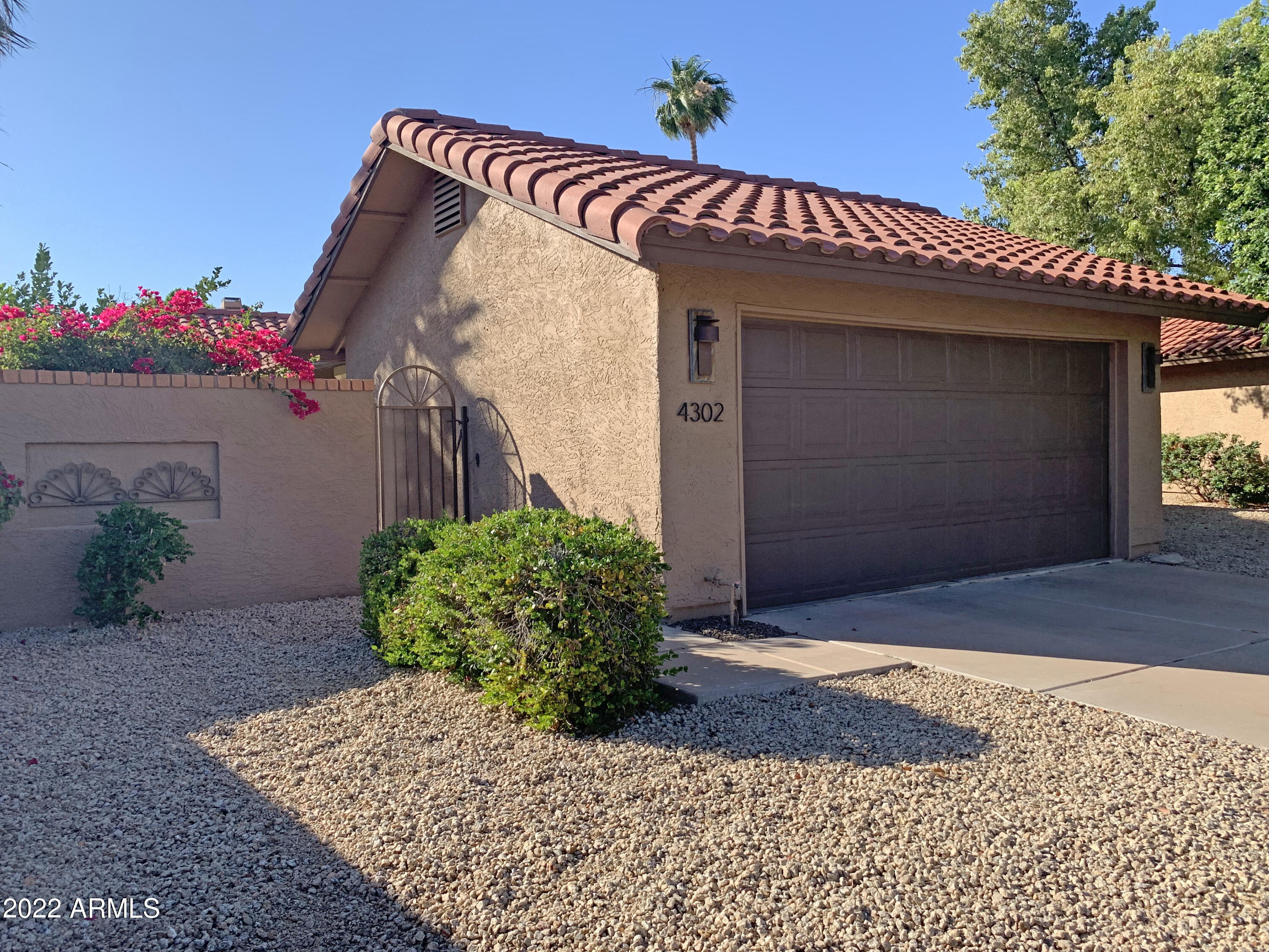 4302 East Bannock Street Phoenix, AZ 85044 - Photo 1 of 55 a front view of a house