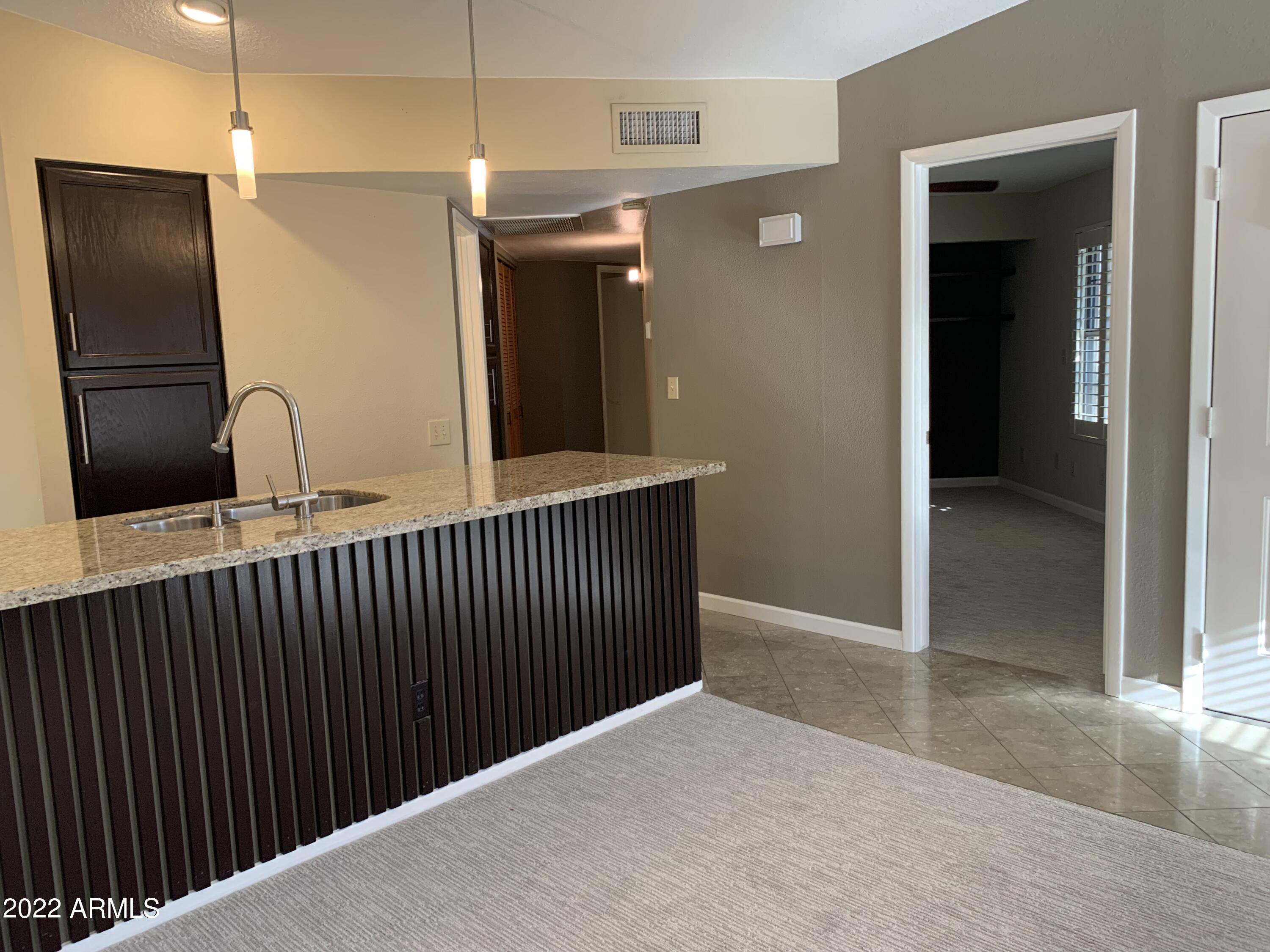 4302 East Bannock Street Phoenix, AZ 85044 - Photo 14 of 55 a view of a hallway