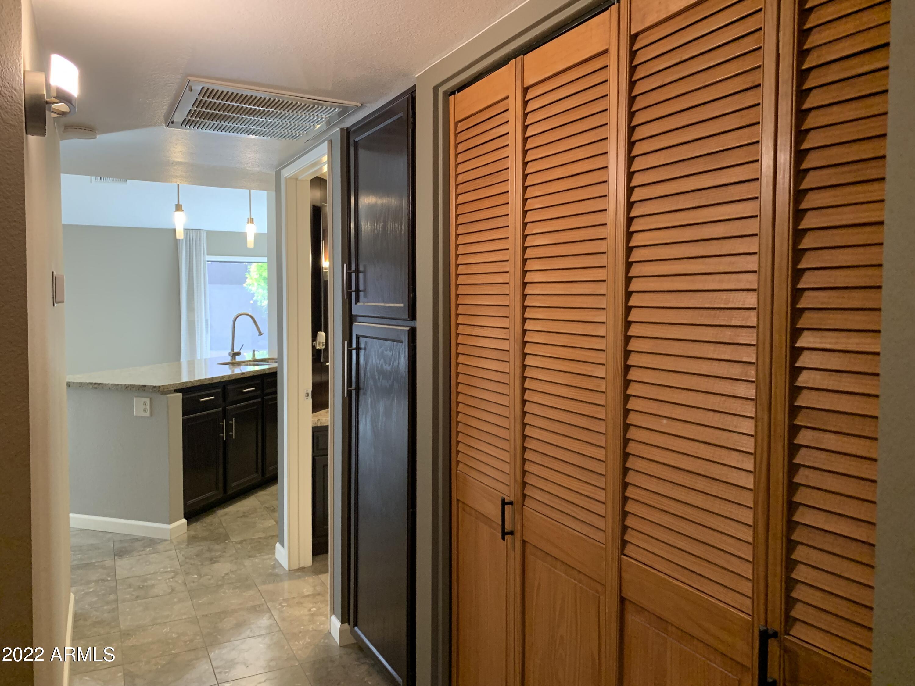 4302 East Bannock Street Phoenix, AZ 85044 - Photo 17 of 55 a bathroom with a shower and a sink