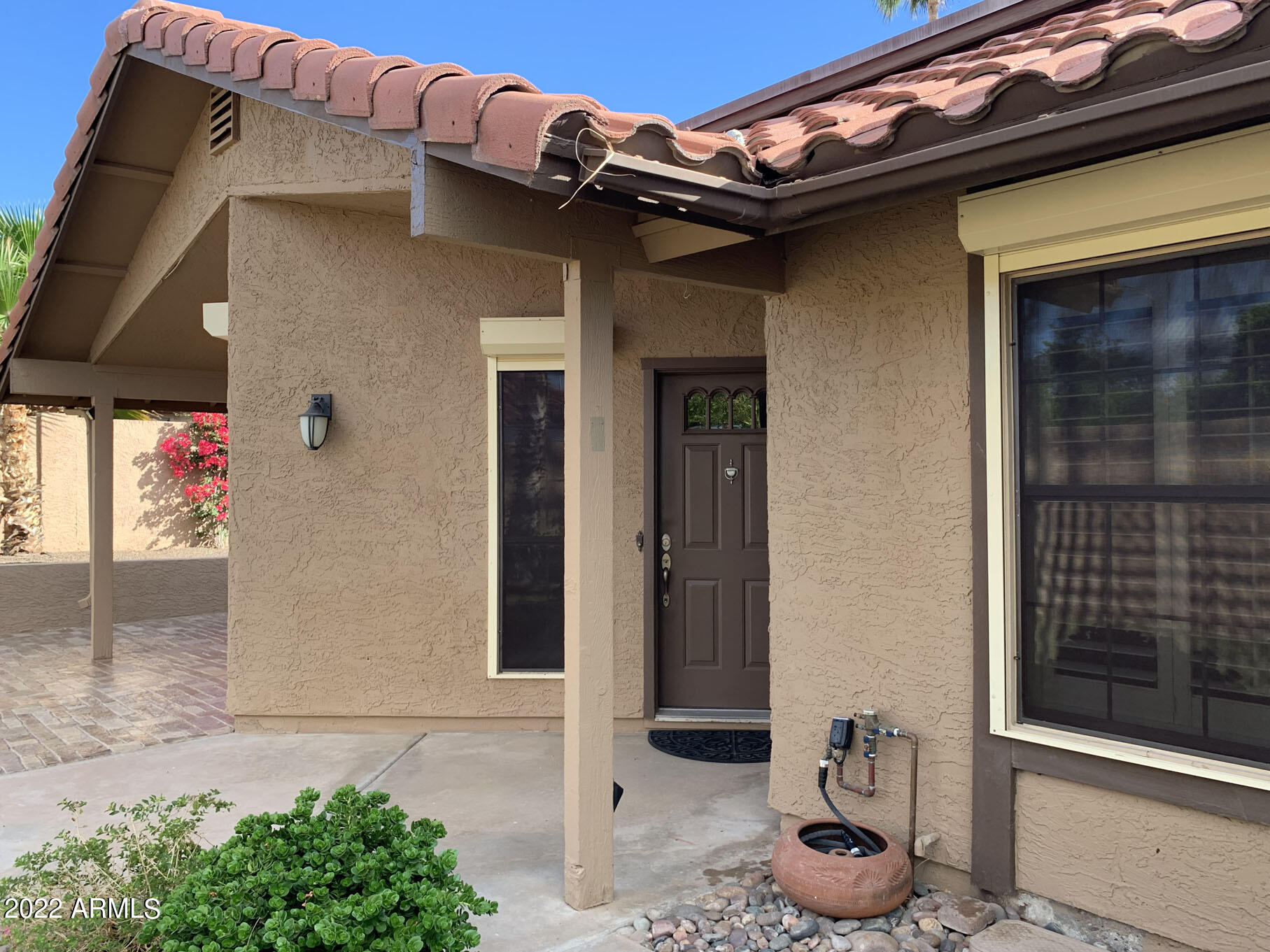 4302 East Bannock Street Phoenix, AZ 85044 - Photo 48 of 55 a front view of a house
