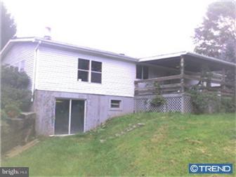 1707 New London Road Landenberg, PA 19350 - Photo 2 of 4 a view of front of house with a yard