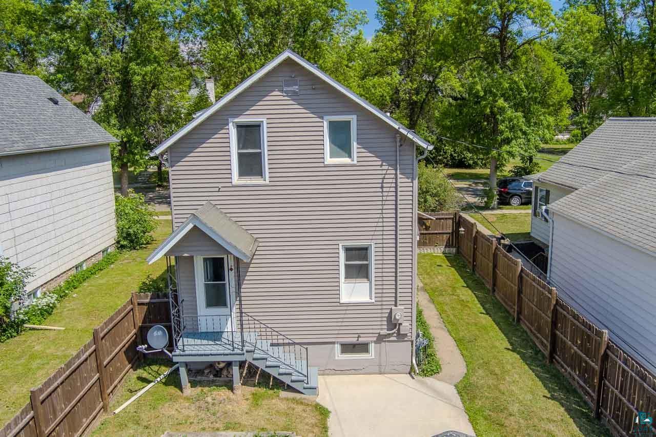 508 10th Street South Virginia, MN 55792 - Photo 39 of 43 Two-story residence featuring light gray siding and a gray shingled roof
