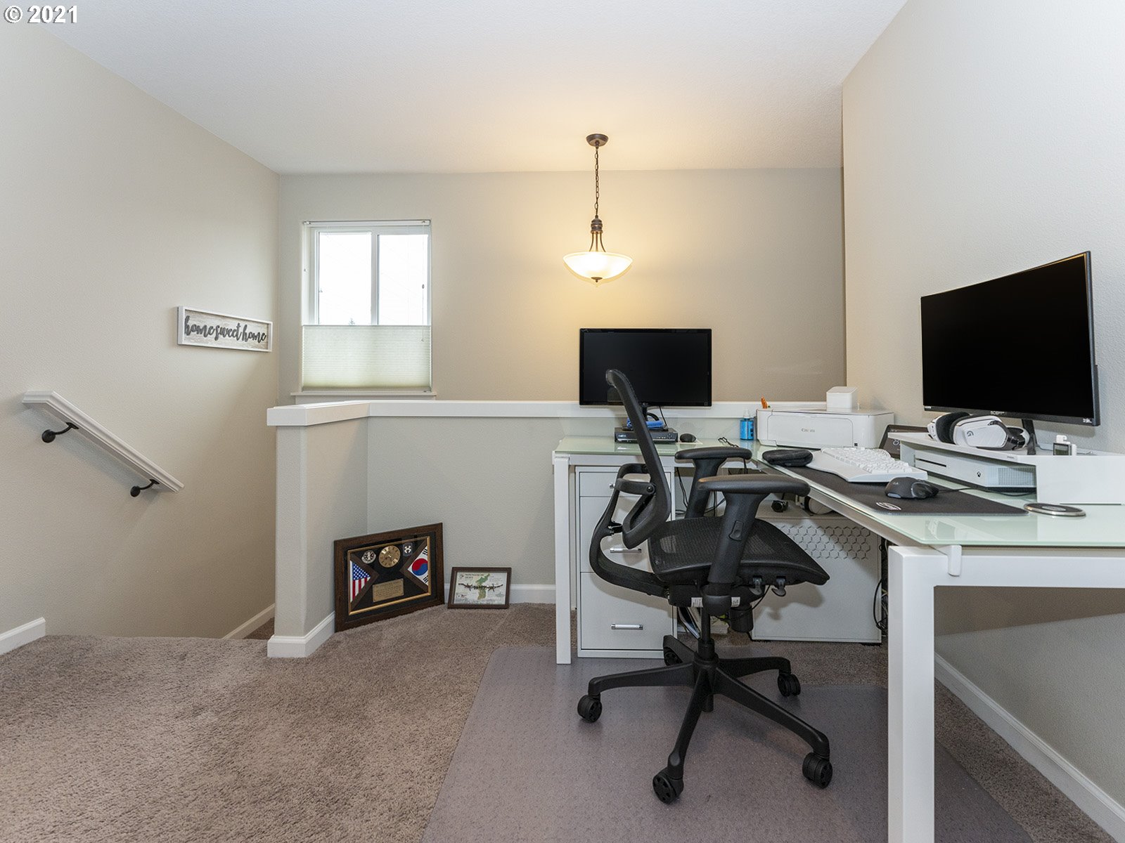 2813 Southeast Baker Avenue Gresham, OR 97080 - Photo 23 of 32 a view of a workspace with furniture and a window