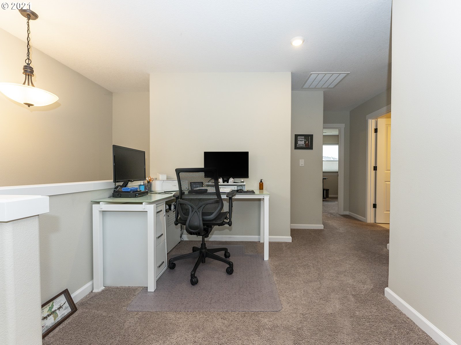 2813 Southeast Baker Avenue Gresham, OR 97080 - Photo 24 of 32 a view of a workspace with furniture and a window