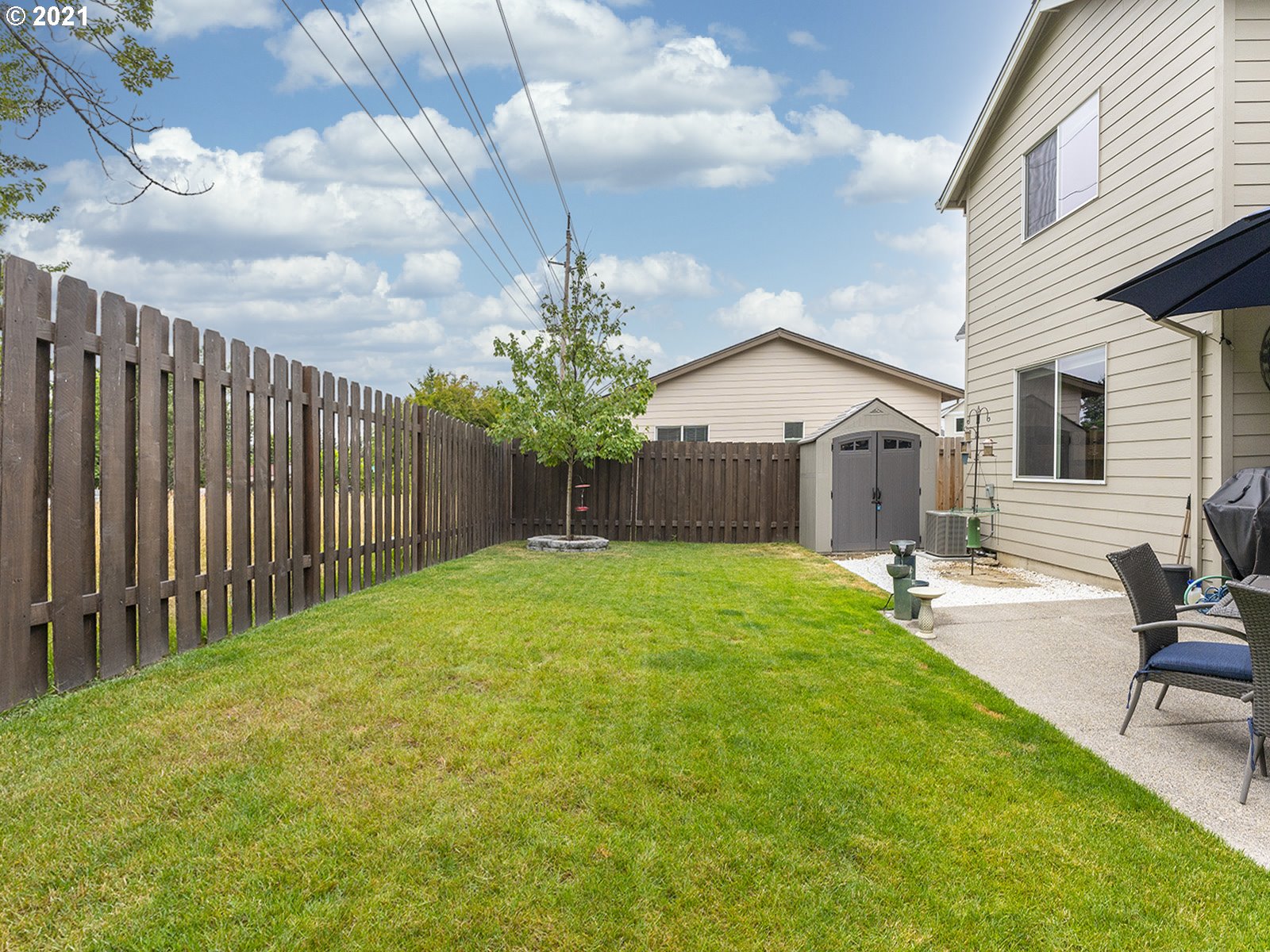 2813 Southeast Baker Avenue Gresham, OR 97080 - Photo 30 of 32 a view of a house with backyard and sitting area