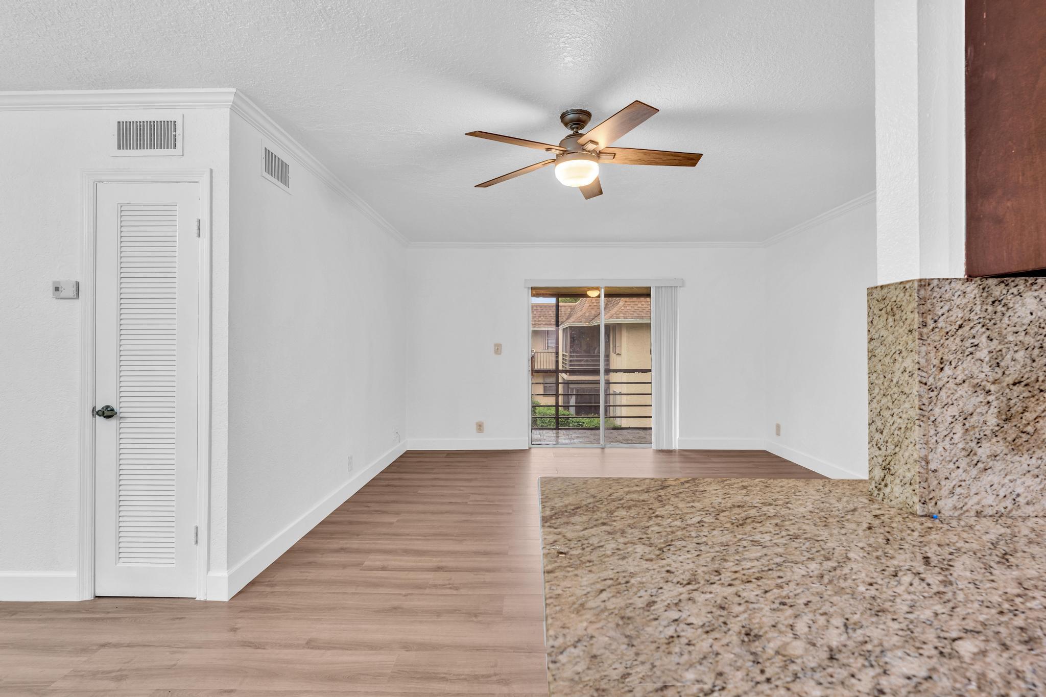 1291 Northwest 13th Street, Unit 445D Boca Raton, FL 33486 - Photo 28 of 50 a view of an empty room with a window