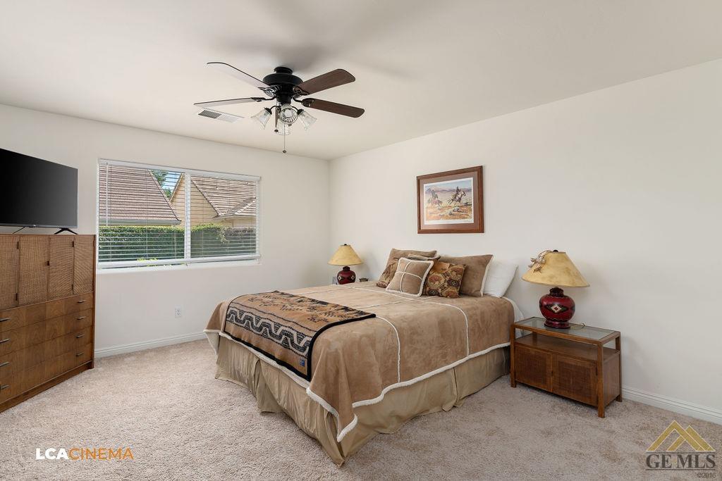 Undisclosed Address Bakersfield, CA 93311 - Photo 16 of 25 a bedroom with a bed and a window