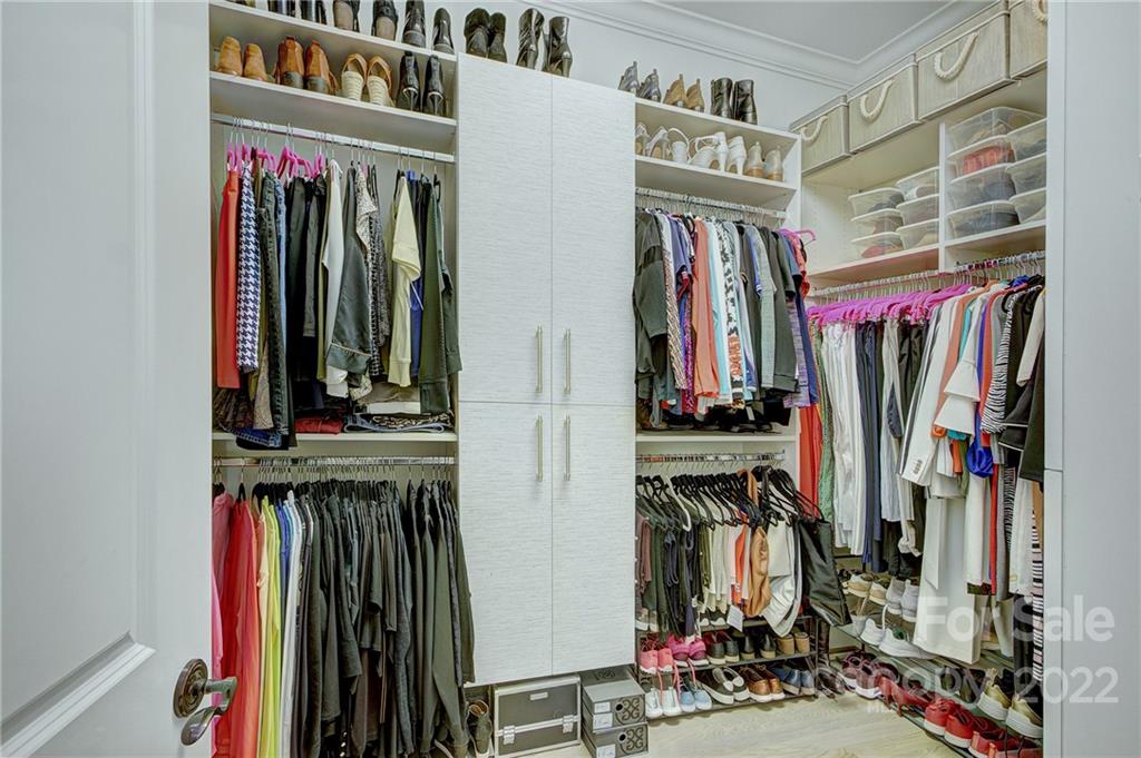 2823 Providence Road, Unit 254 Charlotte, NC 28211 - Photo 20 of 44 a view of walk in closet with clothes
