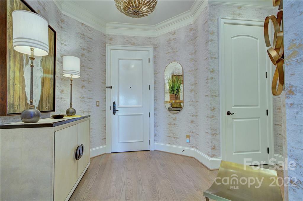 2823 Providence Road, Unit 254 Charlotte, NC 28211 - Photo 2 of 44 a bathroom with a granite countertop sink and a mirror