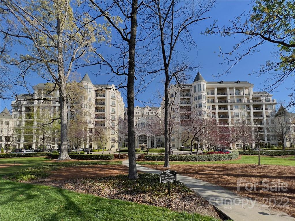 2823 Providence Road, Unit 254 Charlotte, NC 28211 - Photo 29 of 44 a view of a building with a yard