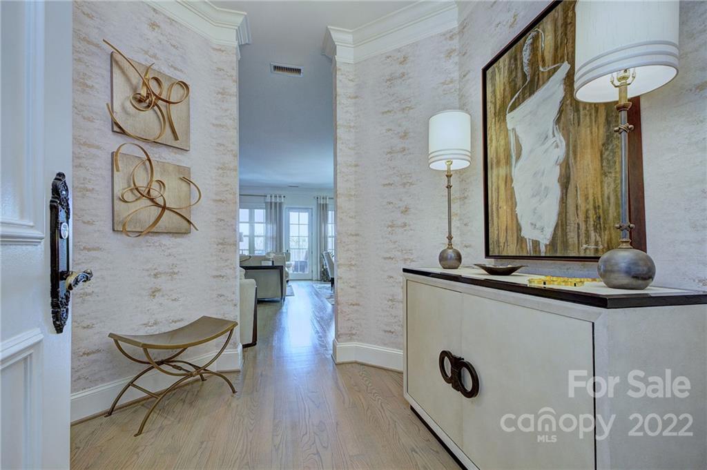 2823 Providence Road, Unit 254 Charlotte, NC 28211 - Photo 3 of 44 a living room with furniture and wooden floor