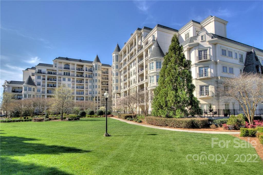 2823 Providence Road, Unit 254 Charlotte, NC 28211 - Photo 32 of 44 a view of a building with a yard