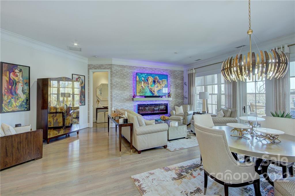 2823 Providence Road, Unit 254 Charlotte, NC 28211 - Photo 4 of 44 a living room with furniture and a large window