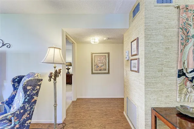 a bedroom with two beds and painted walls
