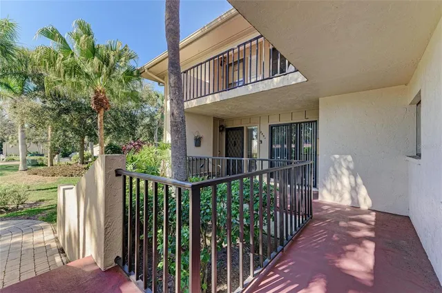 a view of a garden from a balcony