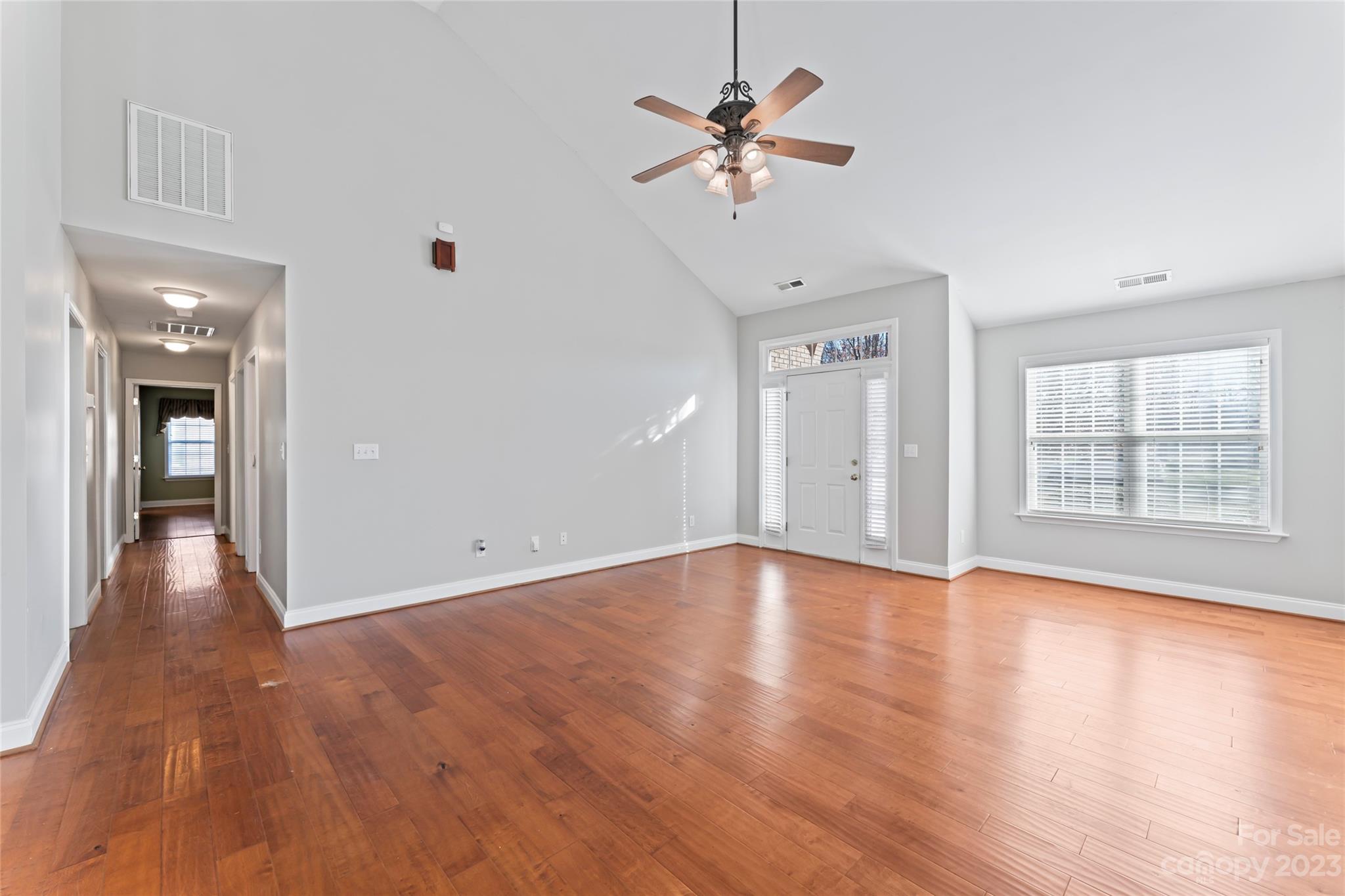 3205 McGee Lane Monroe, NC 28110 - Photo 12 of 34 wooden floor in an empty room with a window