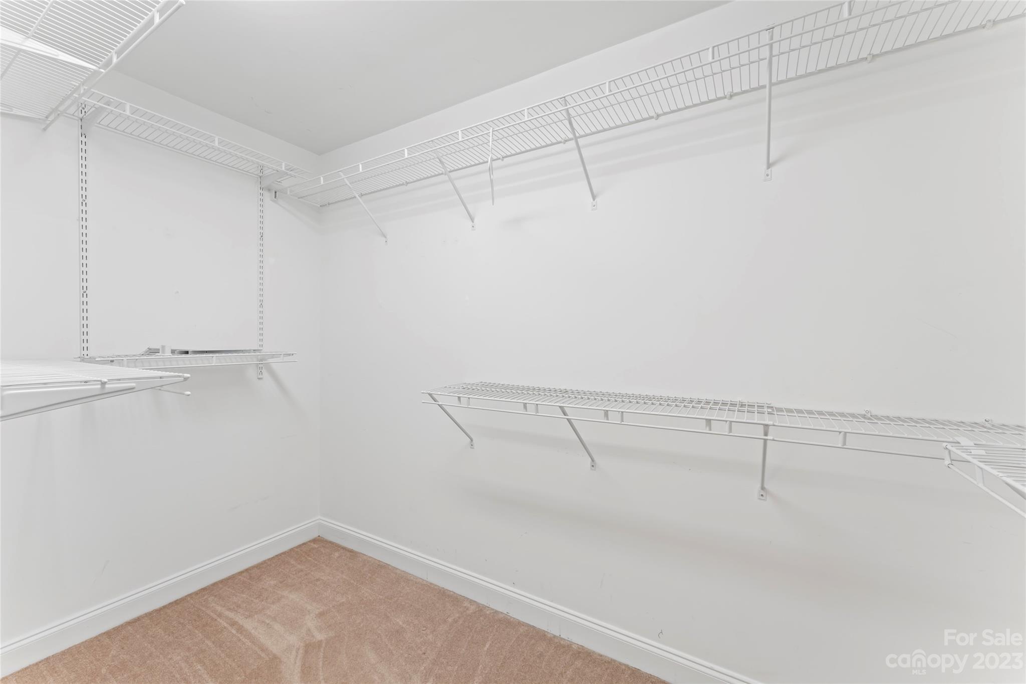 3205 McGee Lane Monroe, NC 28110 - Photo 20 of 34 a view of a room with racks on the wall