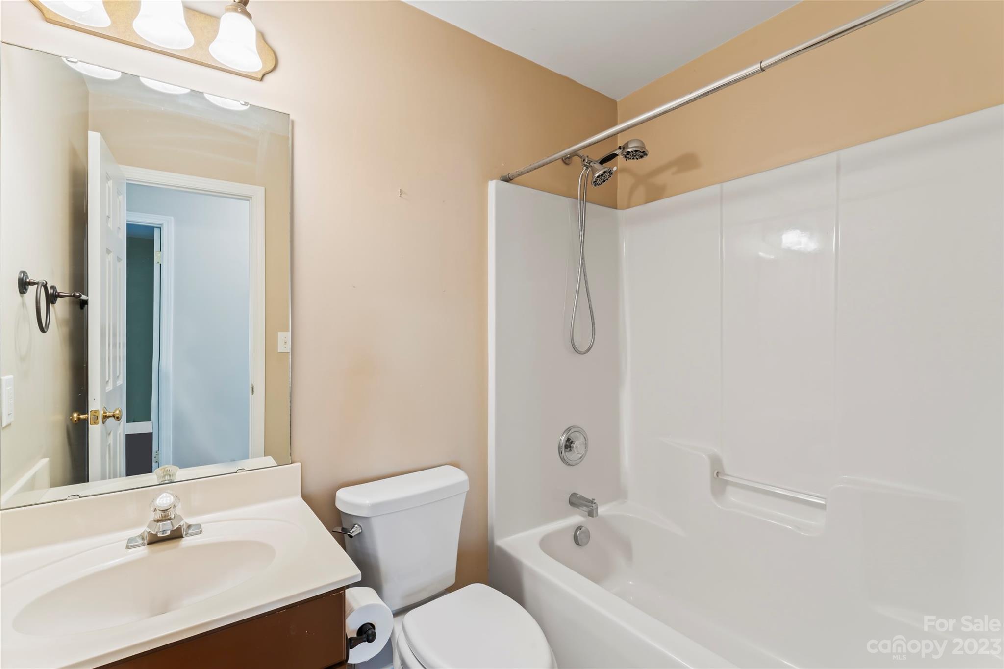 3205 McGee Lane Monroe, NC 28110 - Photo 24 of 34 a bathroom with a sink toilet and shower