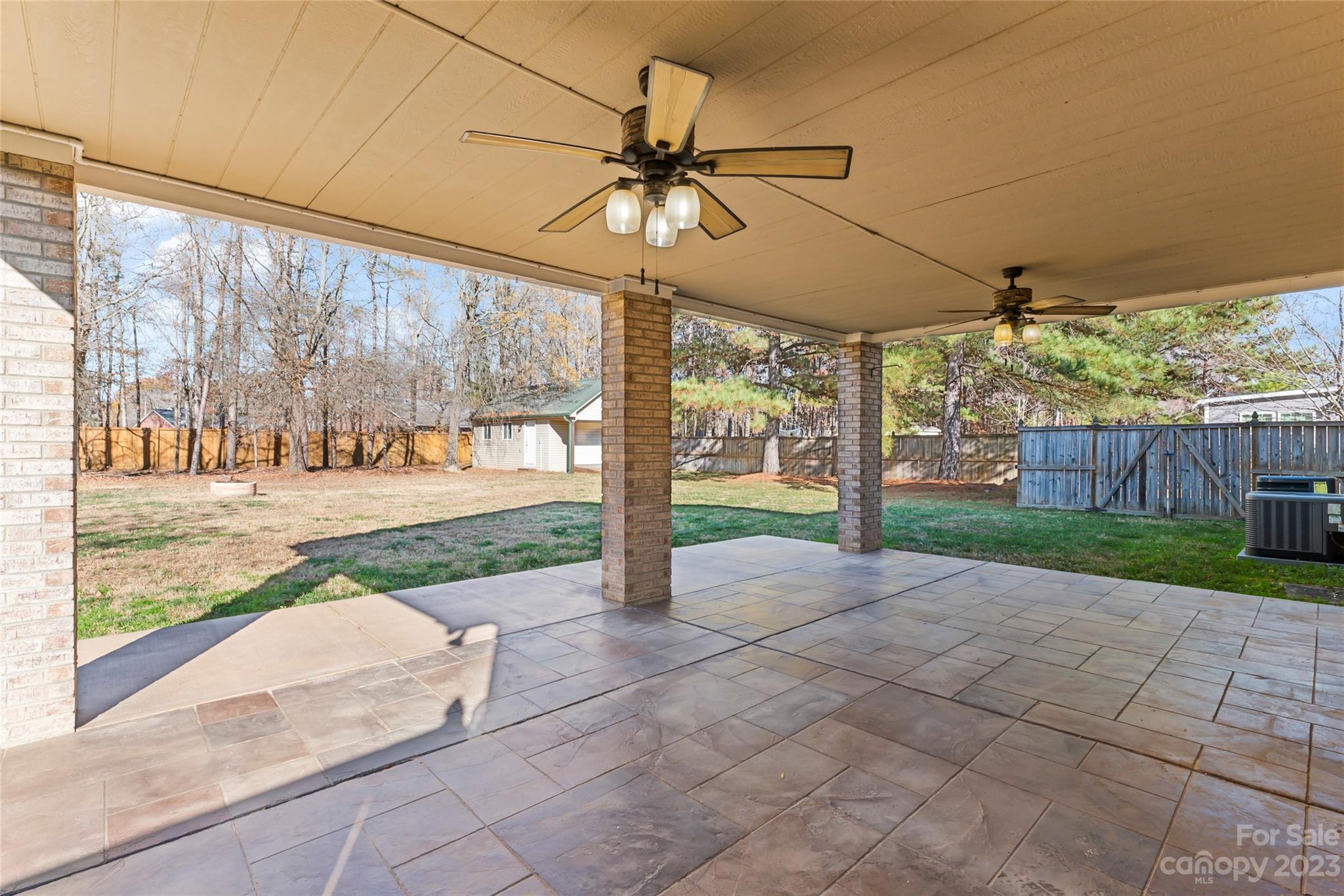 3205 McGee Lane Monroe, NC 28110 - Photo 28 of 34 a view of a porch with furniture and garden