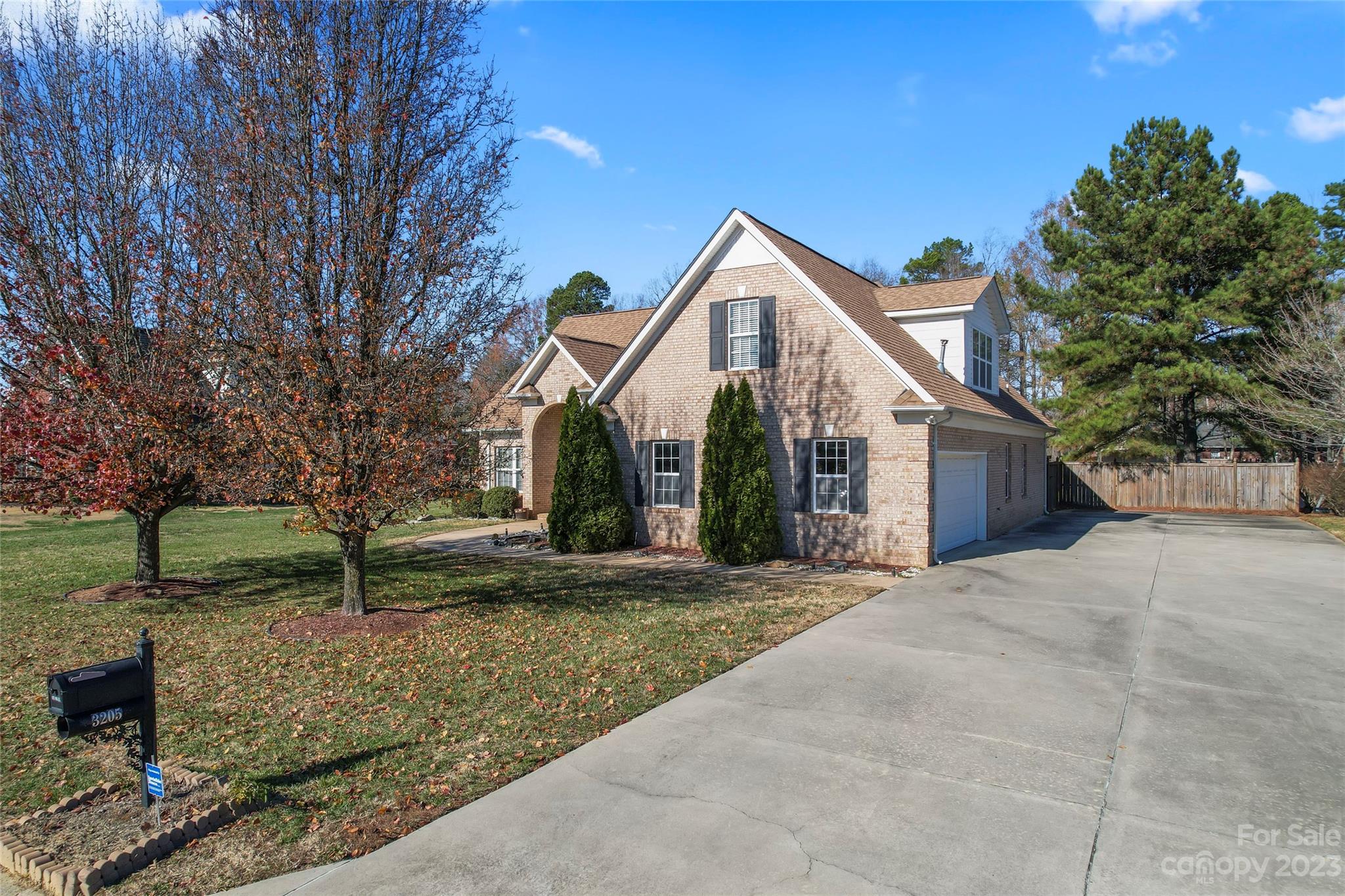 3205 McGee Lane Monroe, NC 28110 - Photo 3 of 34 a view of a house with a yard and tree s