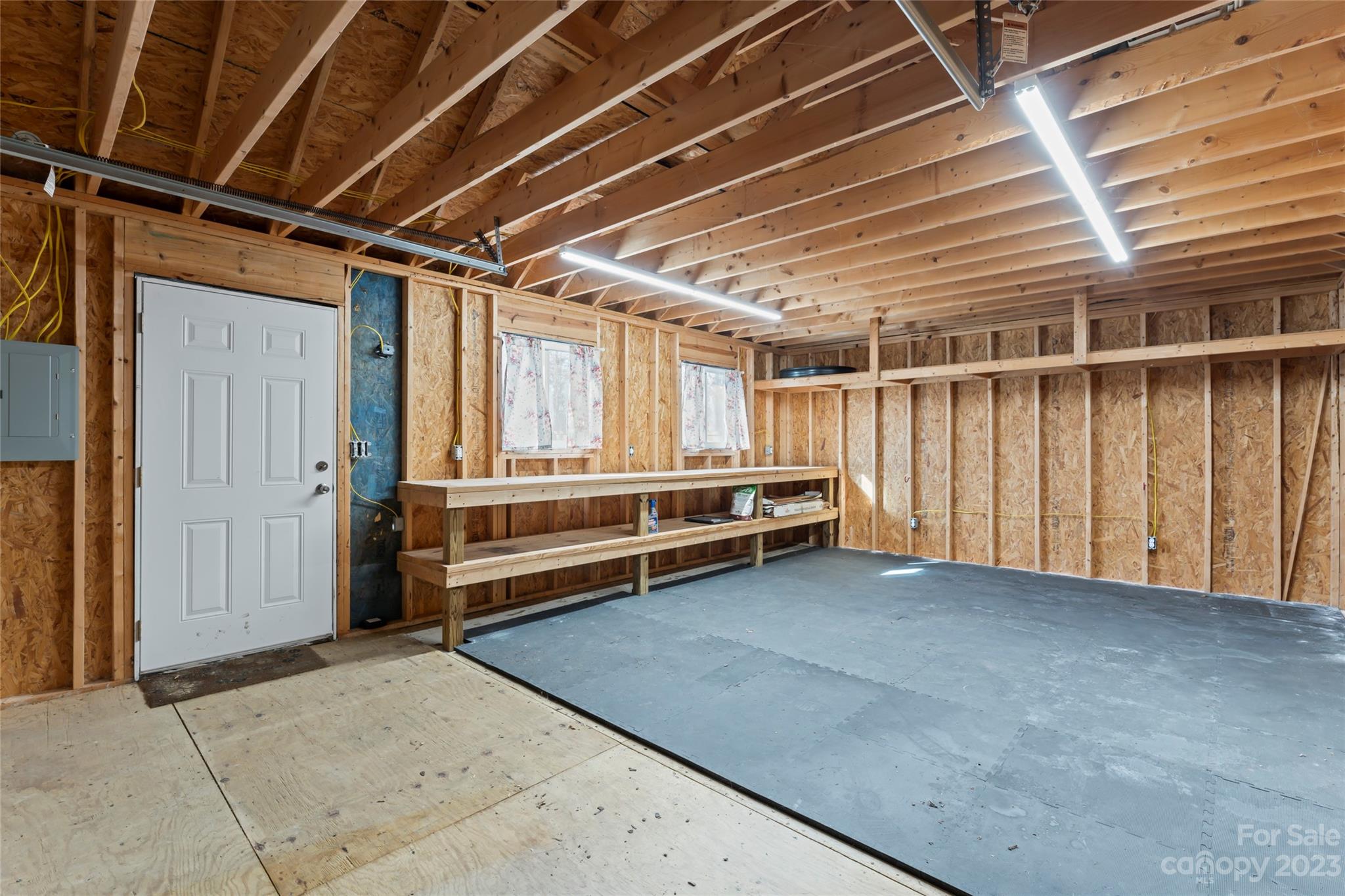 3205 McGee Lane Monroe, NC 28110 - Photo 32 of 34 a view of an empty room with a staircase