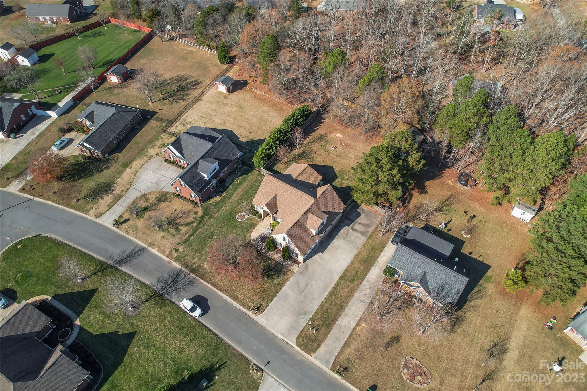 3205 McGee Lane Monroe, NC 28110 - Photo 5 of 34 an aerial view of residential houses with outdoor space