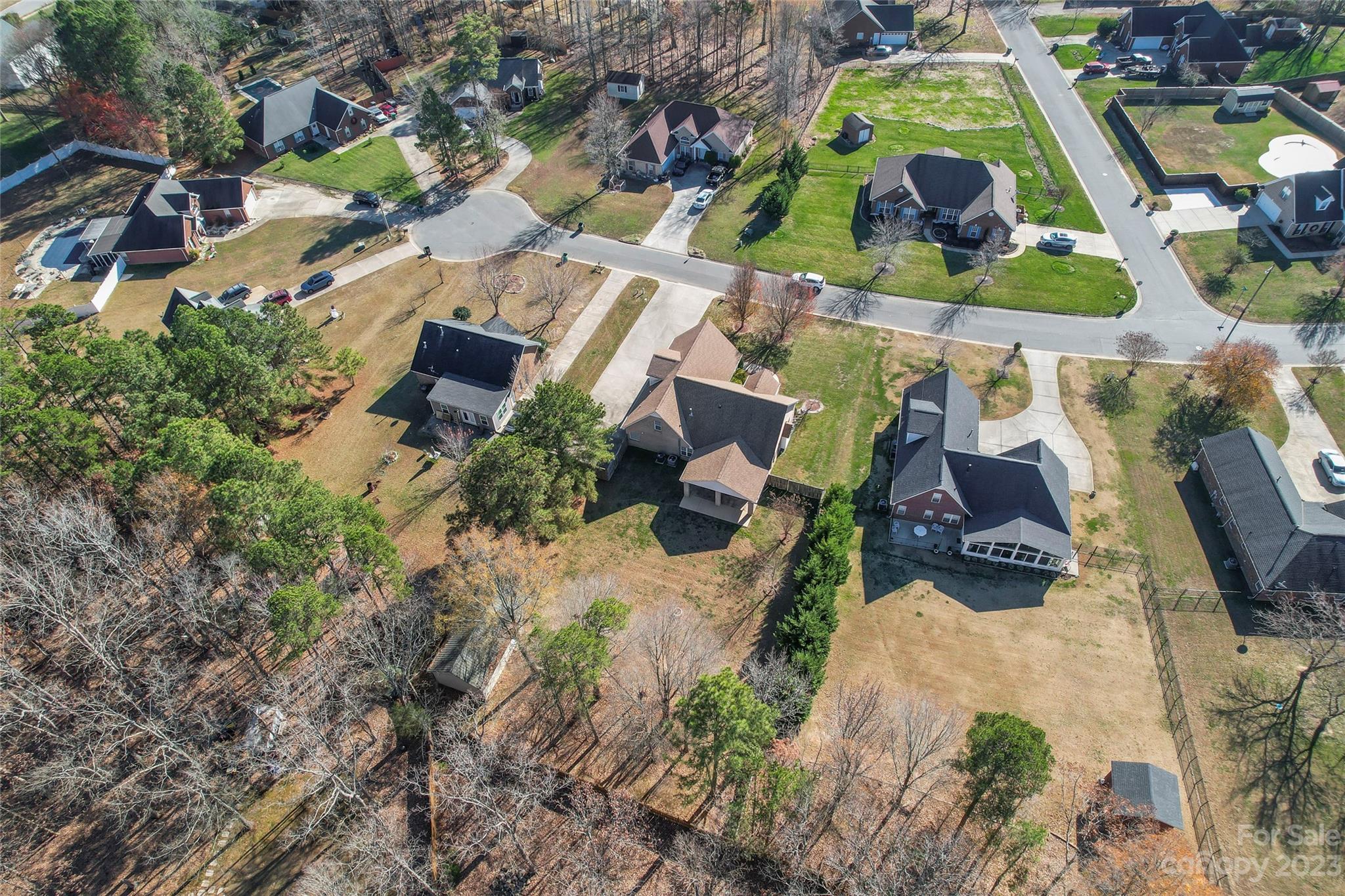 3205 McGee Lane Monroe, NC 28110 - Photo 7 of 34 an aerial view of houses with yard