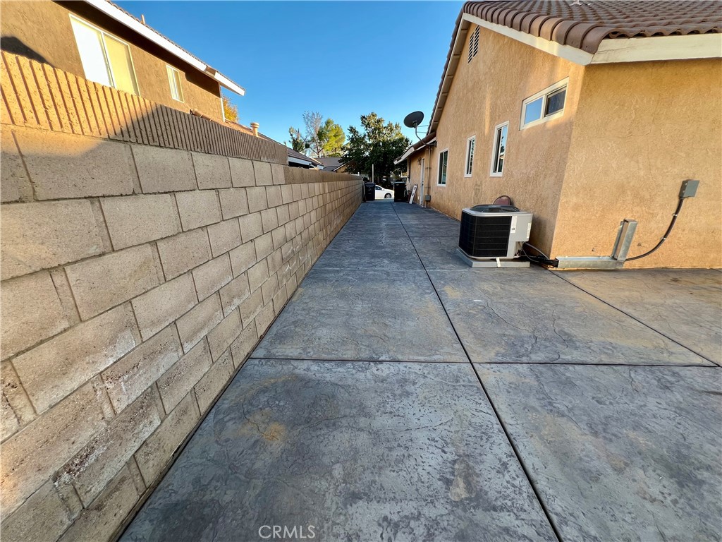 1133 Geraldine Avenue East, Unit B Lancaster, CA 93535 - Photo 26 of 27 a view of a terrace with seating space