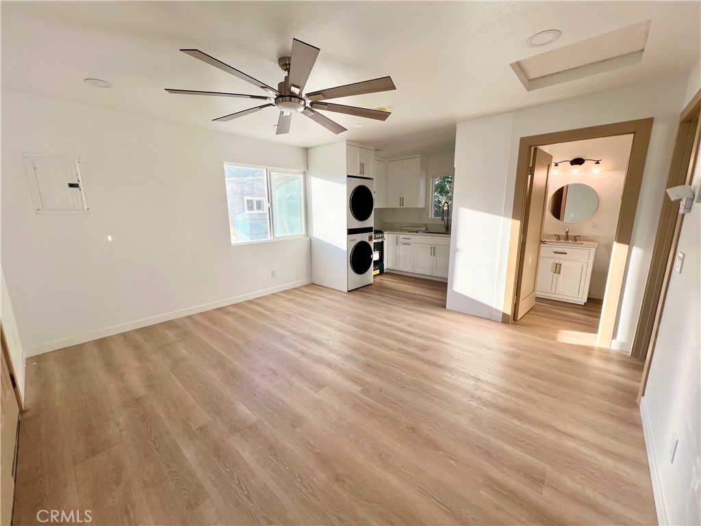 1133 Geraldine Avenue East, Unit B Lancaster, CA 93535 - Photo 5 of 27 a view of a livingroom with a flat screen tv