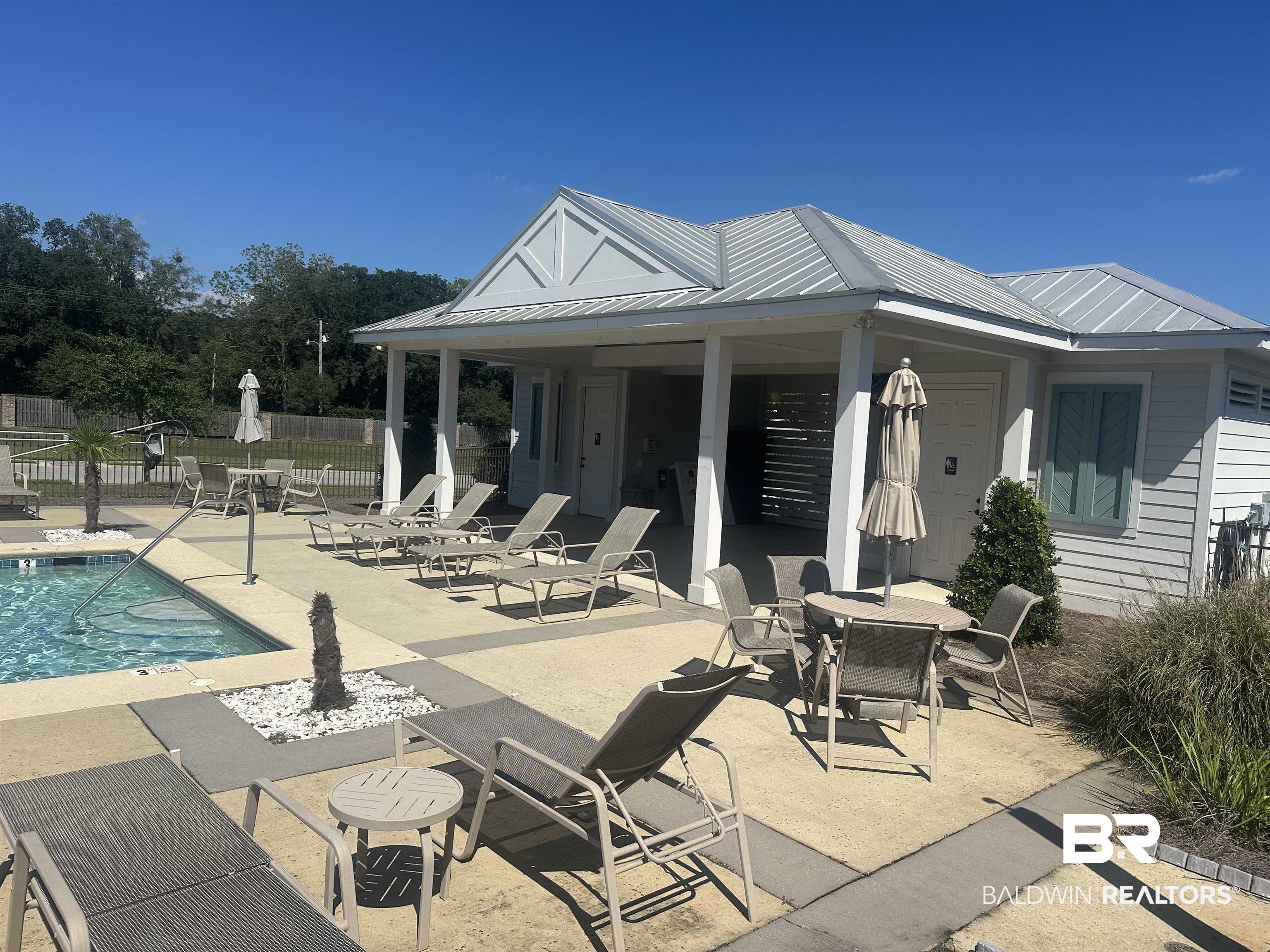 1431 Kairos Loop Foley, AL 36535 - Photo 26 of 27 View of pool with a patio
