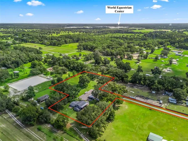 an aerial view of a golf course with a yard