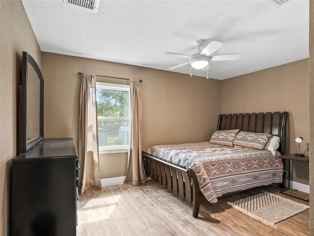 10291 Highway 40 Ocala, FL 34482 - Photo 3 of 21 a bedroom with a bed and a window