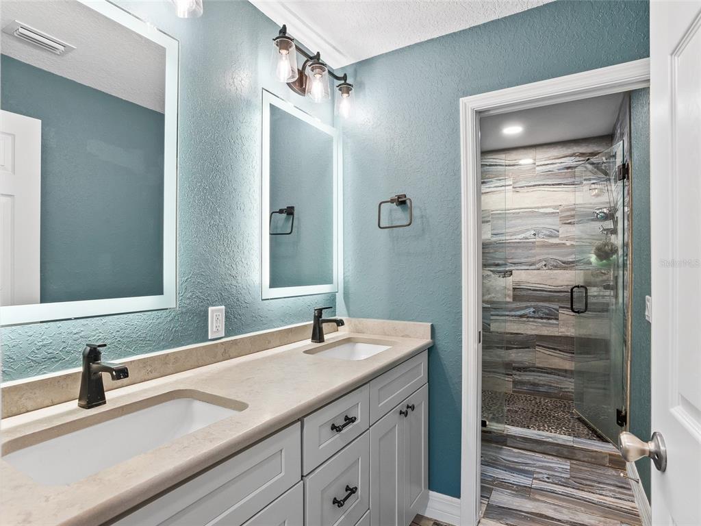 10291 Highway 40 Ocala, FL 34482 - Photo 6 of 21 a bathroom with a sink and a mirror