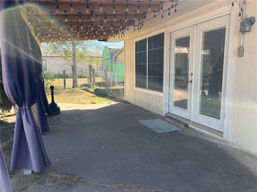 24748 County Road 350 Mathis, TX 78368 - Photo 10 of 16 a swimming pool with outdoor seating and yard