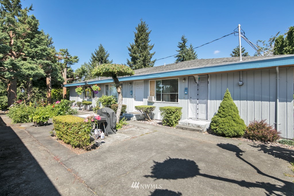555 Index Place Northeast Renton, WA 98056 - Photo 3 of 4 a view of a porch with furniture and a yard