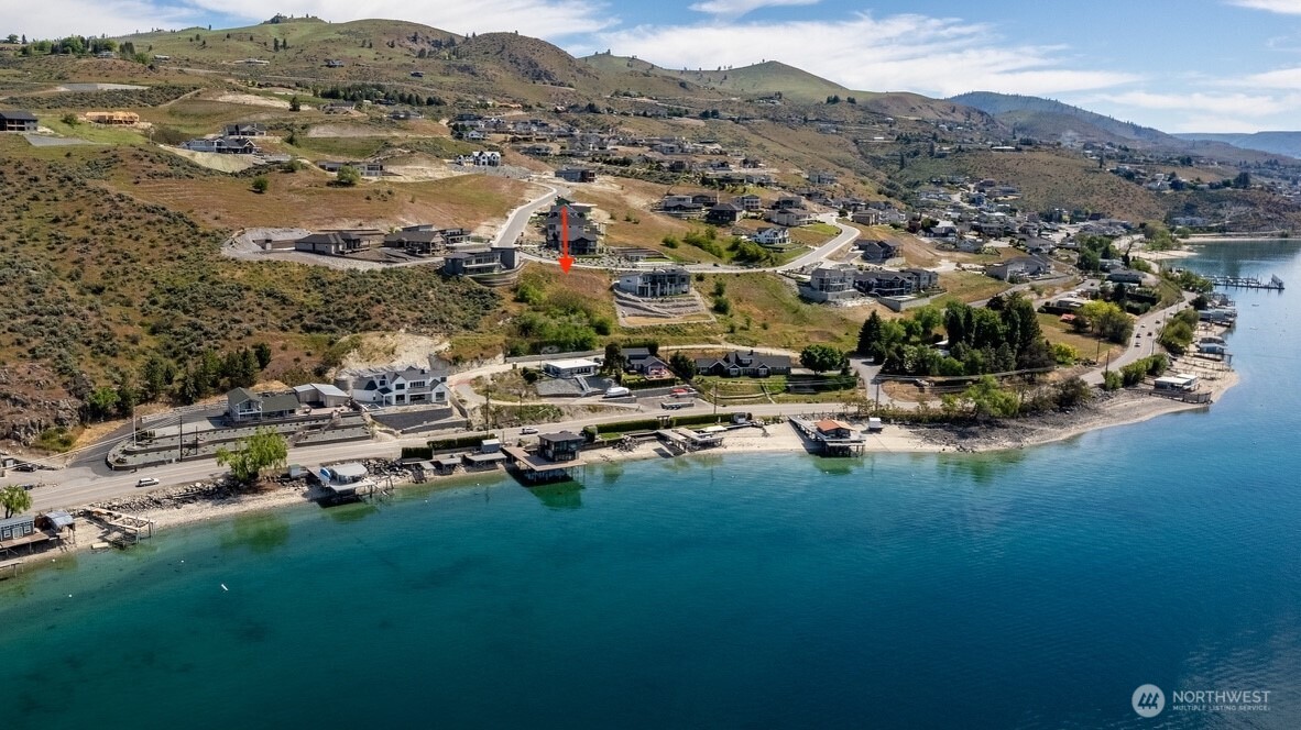 209 Apple Avenue Chelan, WA 98816 - Photo 14 of 28 an aerial view of a residential houses with outdoor space and trees