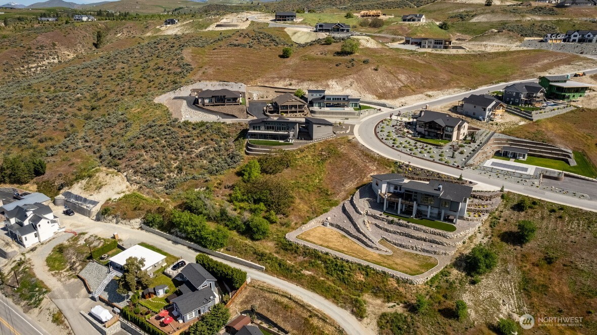 209 Apple Avenue Chelan, WA 98816 - Photo 25 of 28 an aerial view of residential houses with outdoor space
