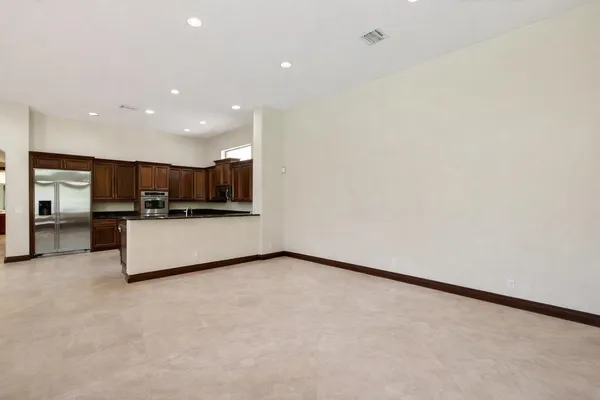 a bathroom with a toilet a sink and a mirror