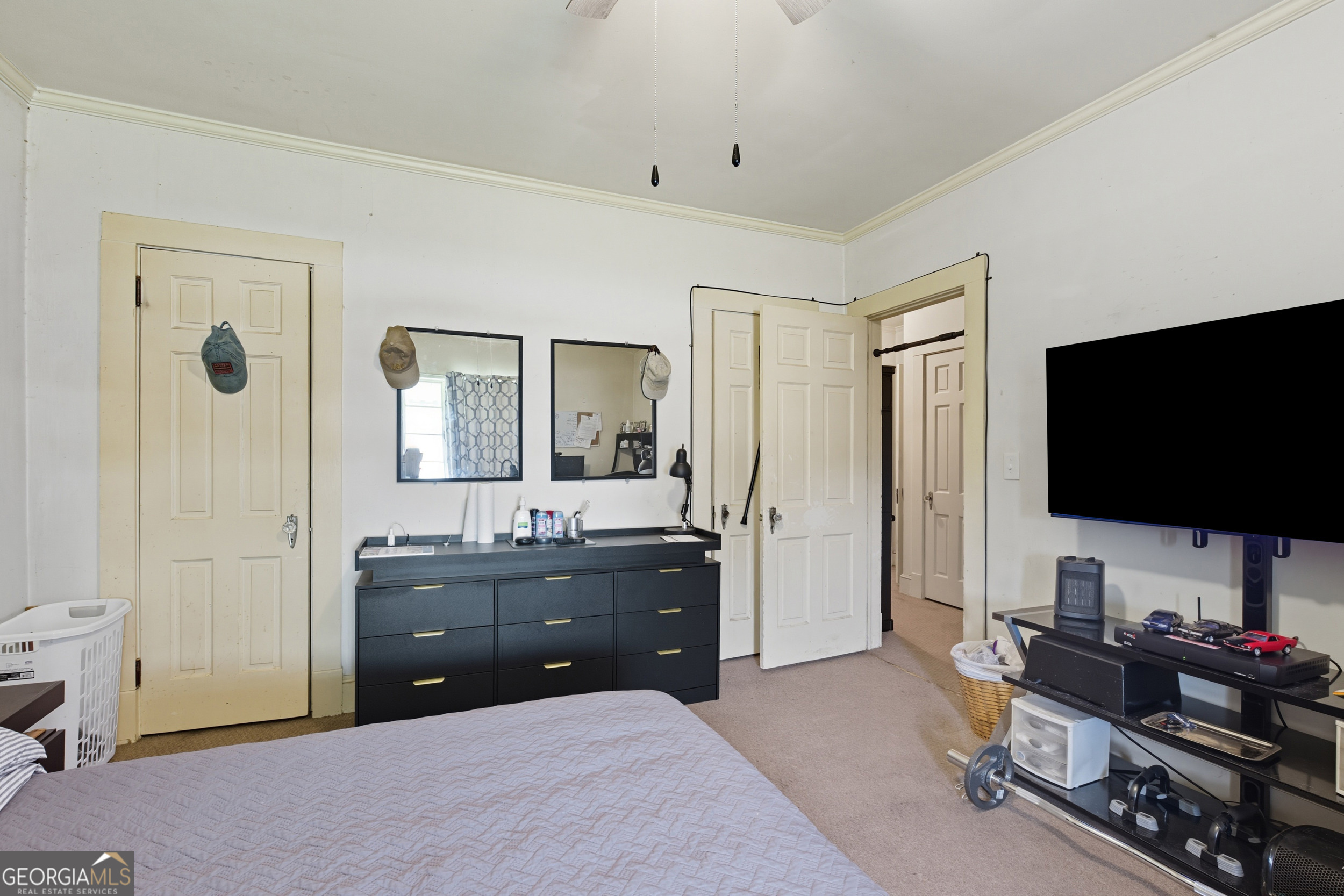 45 Hayes Street Toccoa, GA 30577 - Photo 11 of 23 a bedroom with a bed and a flat screen tv