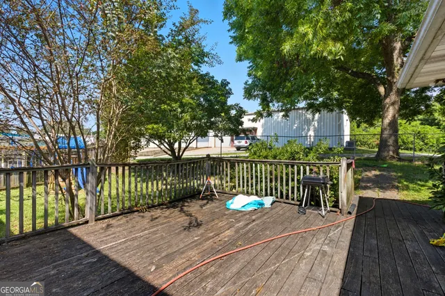 a bath room with a bath tub and a shower